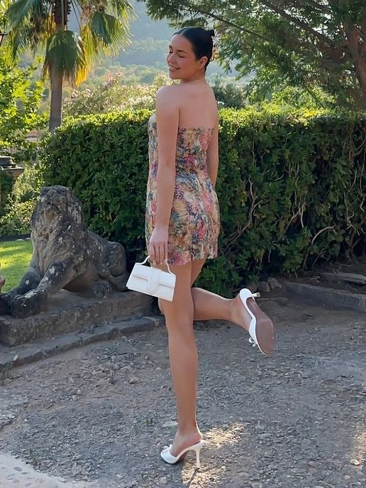 sequin mini dress styled with metallic accessories and choker