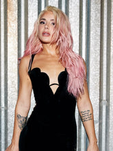 Black deep V neck bandage jumpsuit styled for clubwear