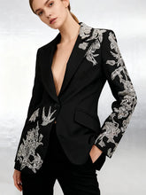 Black slim blazer with intricate beaded detailing on sleeves