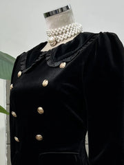 Buttoned cocktail dress with structured silhouette and Peter Pan neckline