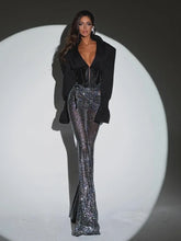 Black cropped jacket and glitter pant set for standout party style
