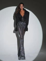 Black cropped jacket and glitter pant set for standout party style