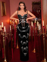 Black crystal bandage mini dress styled for evening club parties