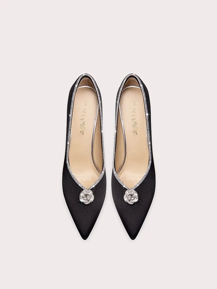 Black crystal pointed party pumps styled for modern occasions