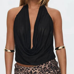 Close-up of black cowl neck halter showing soft fabric drape