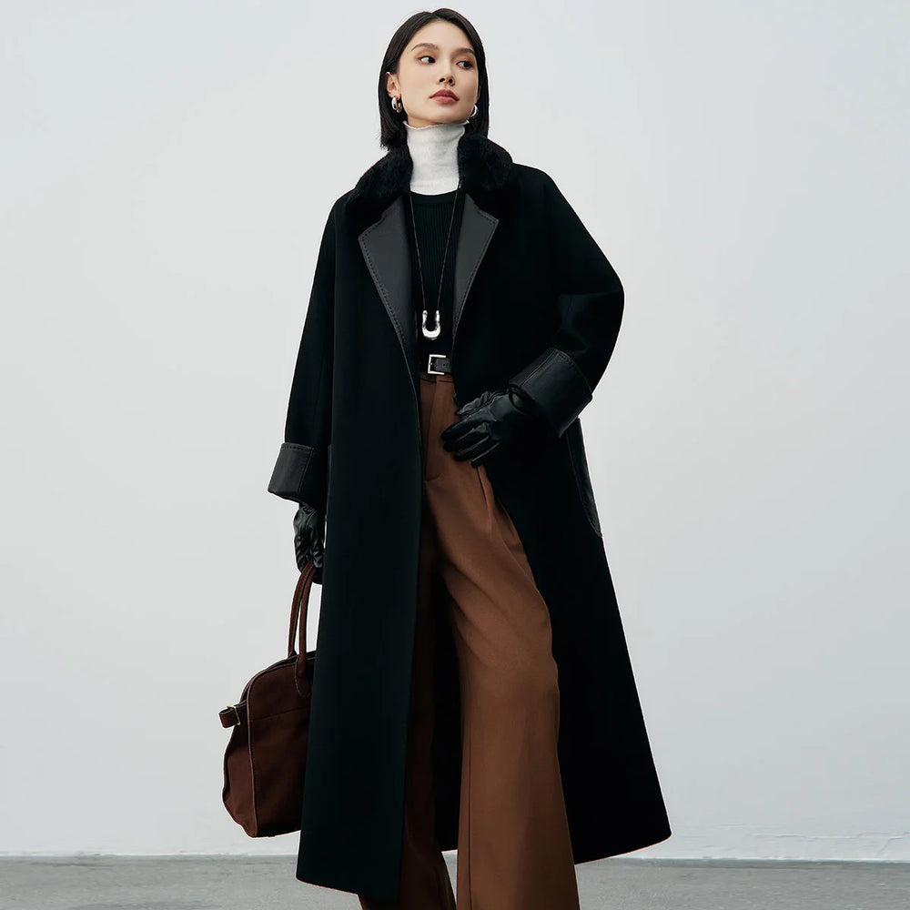 Long black coat with fur collar and leather details