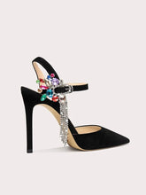 Black gemstone chain party sandals styled for formal celebrations