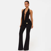Black halter top and flared pants two-piece set with open-back detail