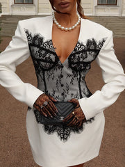 Long sleeve white dress with A-line silhouette and lace detailing