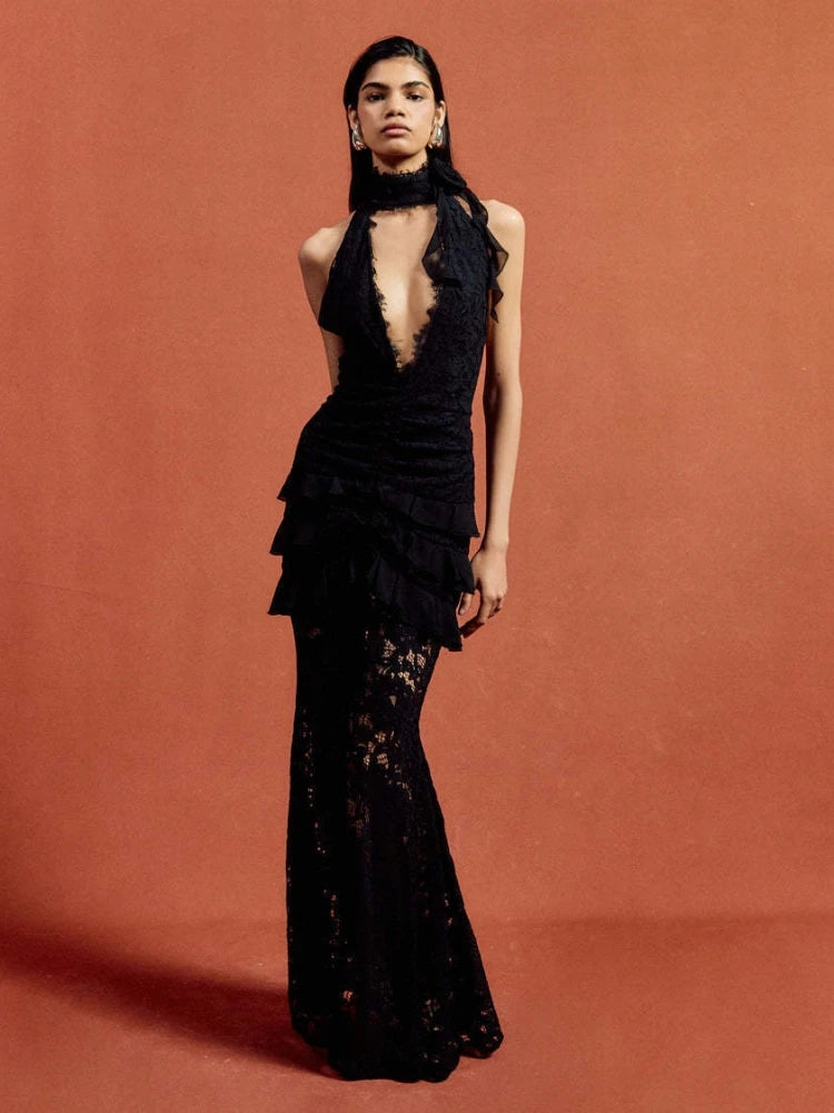 Black lace tiered evening gown styled for dramatic formal occasions