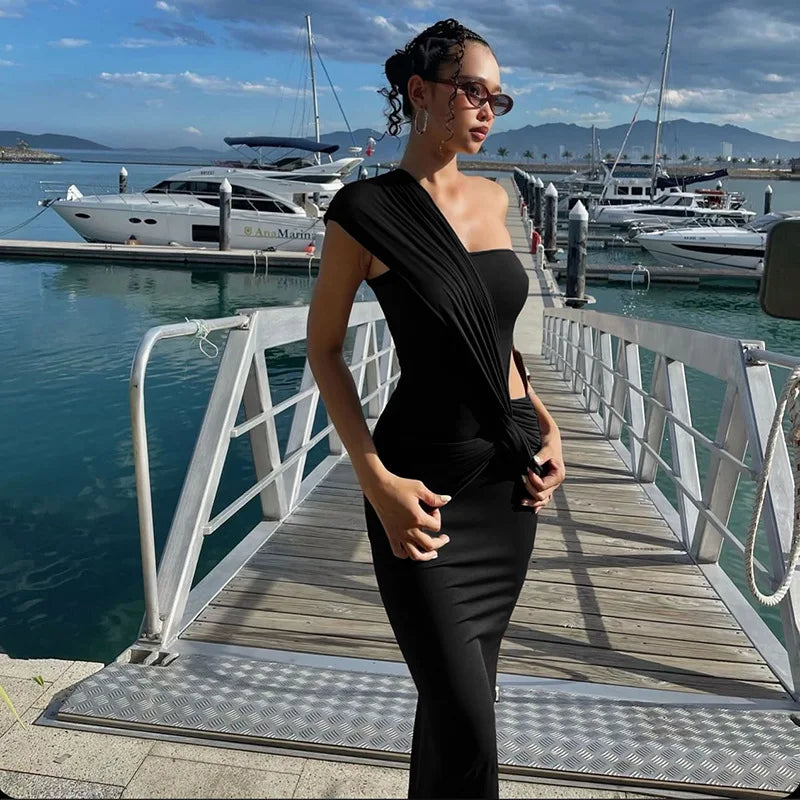 Minimalist one-shoulder formal dress with empire waist silhouette