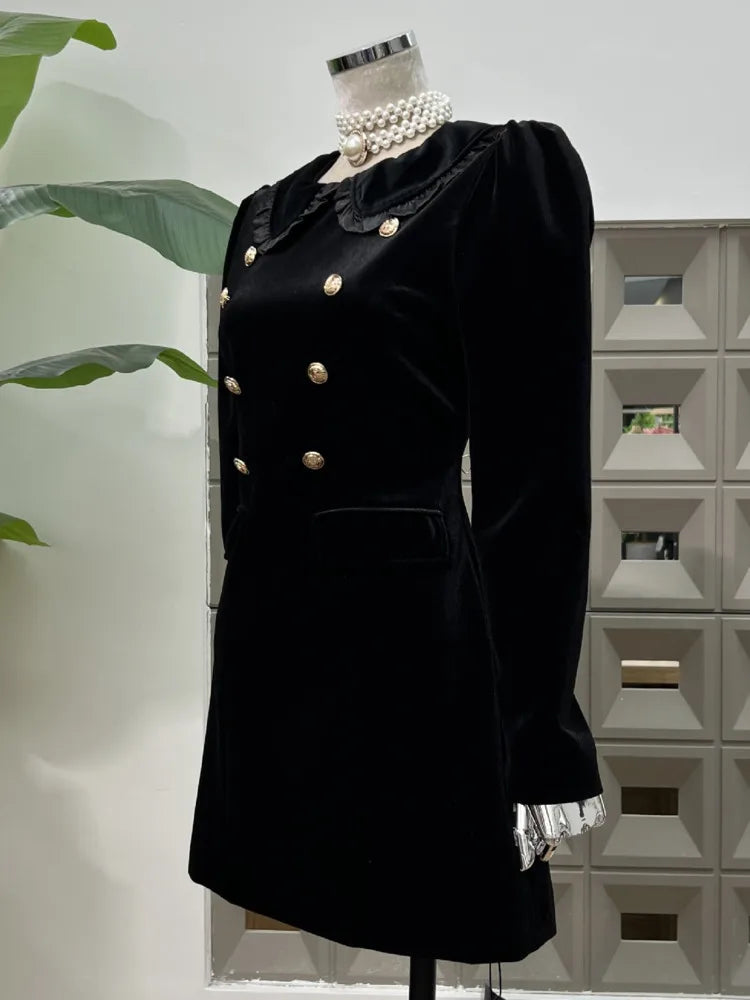 Long-sleeve black dress with contrast trim and button detailing front view