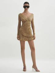 Woman wearing a black mesh bodycon mini styled for evening events on a white background