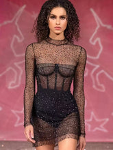 Black mesh diamond mini dress styled for nightclub parties