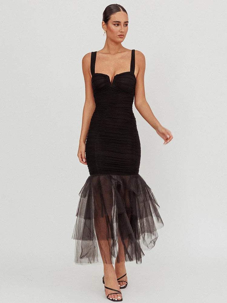 Black mesh hem mermaid dress styled for formal events