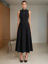 Black O neck tank backless beaded dress styled for evening parties