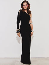 Front view of black one-shoulder maxi dress with thigh-high slit on white background