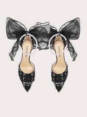 Black pearl sheer bow party sandals styled for formal celebrations