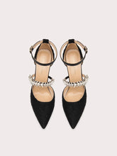 Black pearl strap stiletto heels styled for elegant party events