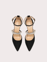 Black pearl strap stiletto heels styled for elegant party events