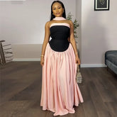 Black and pink patchwork ball gown styled for a formal event