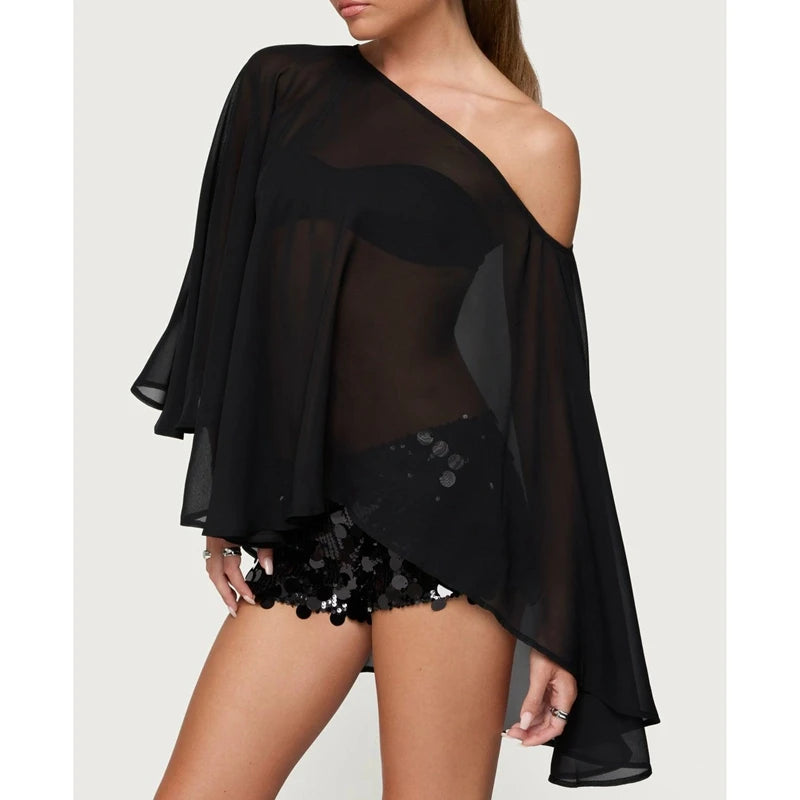 Black sheer batwing blouse styled for women in modern outfits