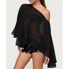Black sheer batwing blouse styled for women in modern outfits
