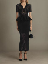 “Black sheer ruffle ankle-length dress with V-neck and button detailing”