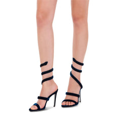 Black spiral lace-up party sandals styled for night events