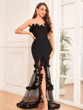 Black strapless ruffled mesh gown styled for statement parties