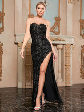 Black strapless silk mesh dress styled for evening parties
