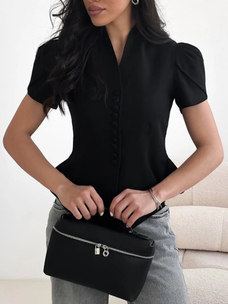 Black v-neck puff sleeve button blouse styled for office capsule wardrobe