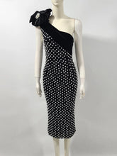 Black and white dot party midi gown styled for bold evening occasions