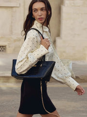 Black and white dot party shirt worn as modern streetwear city edit