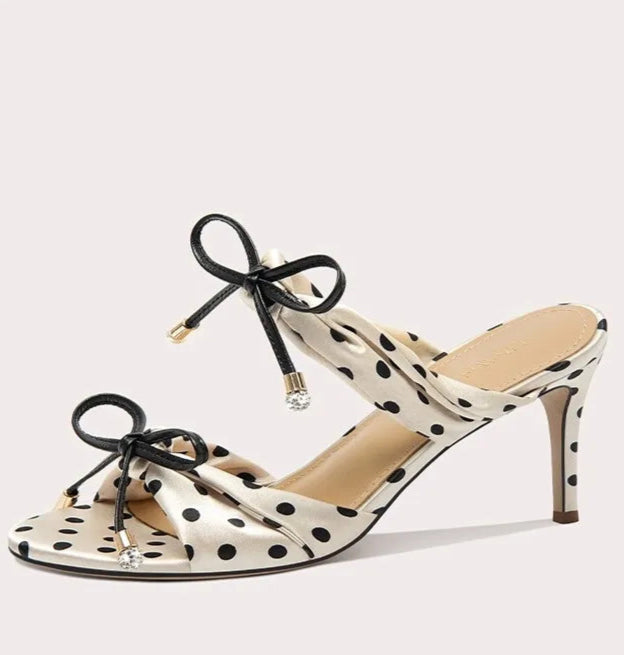 Black and white high heel dress shoes for formal and festive occasions