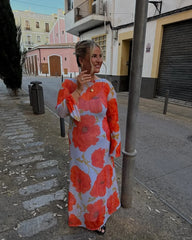 close view of crew neckline and waist on poppy floral dress