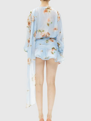 Sleeved lightweight dress with ruffle detailing for warm weather