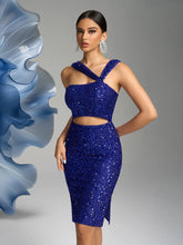 Blue sequin crisscross cutout dress styled for parties