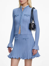 Two-piece set with V-neck long sleeve top and high-waist mini skirt