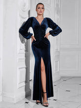 Blue velvet ruched V neck long sleeve dress styled for formal evenings