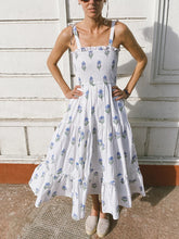 Blue and white boho floral maxi dress styled for summer