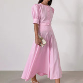 Blush pink two-piece midi dress with flowing A-line skirt for spring events