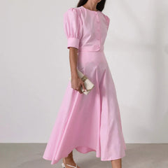 Blush pink two-piece midi dress with flowing A-line skirt for spring events
