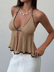 A bohemian-style sleeveless vest, showing the knitted texture.