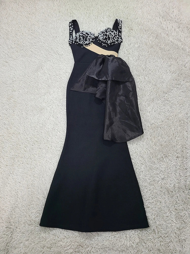 Bow detail black formal gown perfect for statement entrances