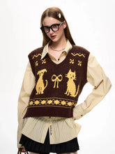 Brown sweater vest with cat and dog cartoons styled over shirt