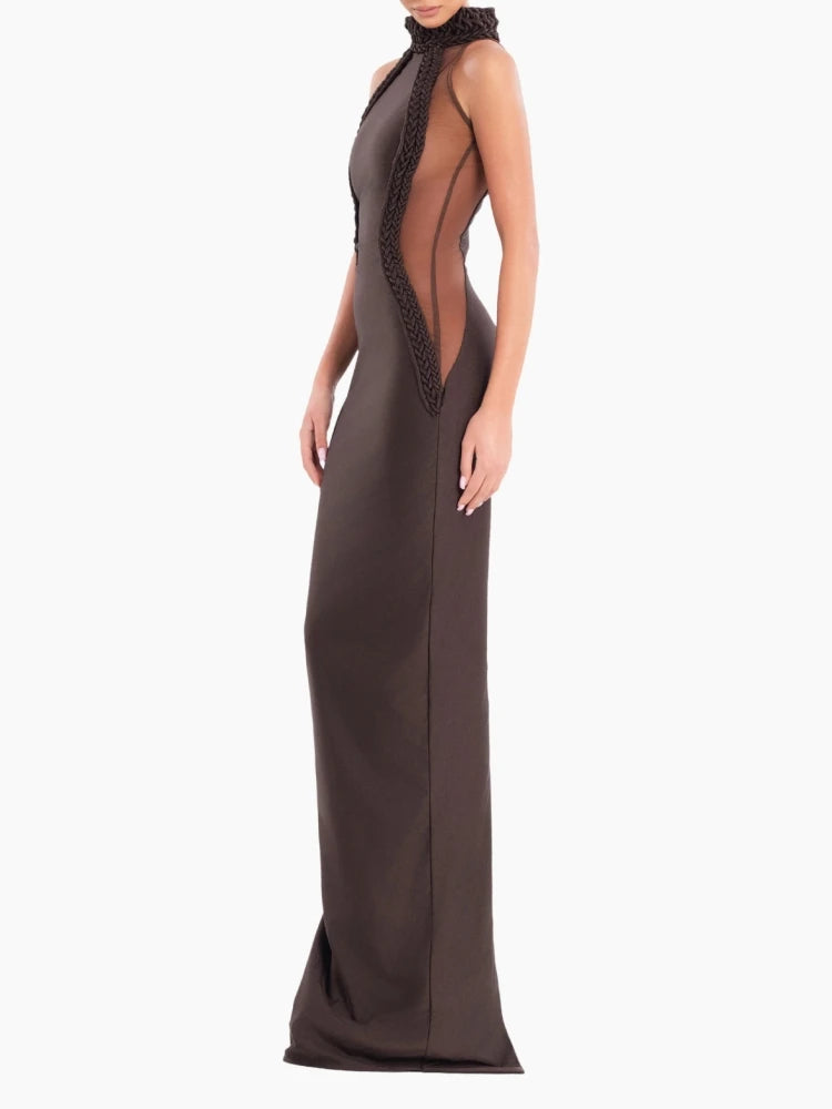Side view of slim brown mesh-panel sheath maxi dress with zip back and floor-length hem on a white background