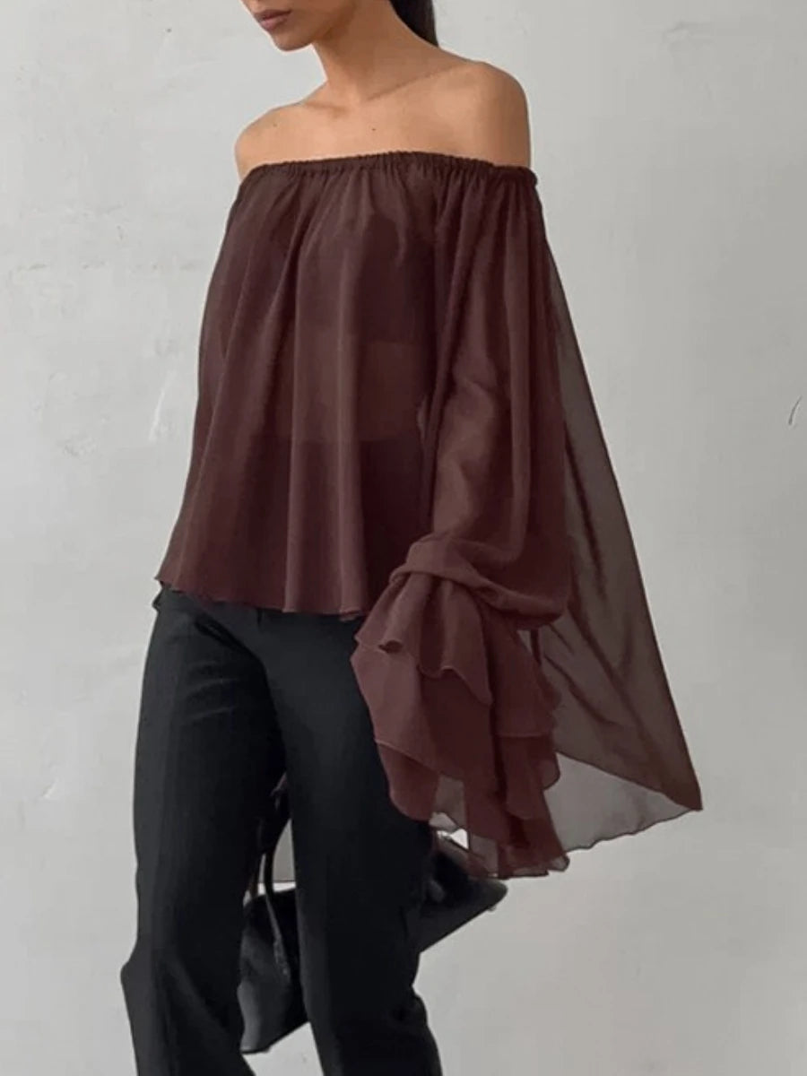 Brown off-shoulder ruffle blouse styled for autumn casual and club looks
