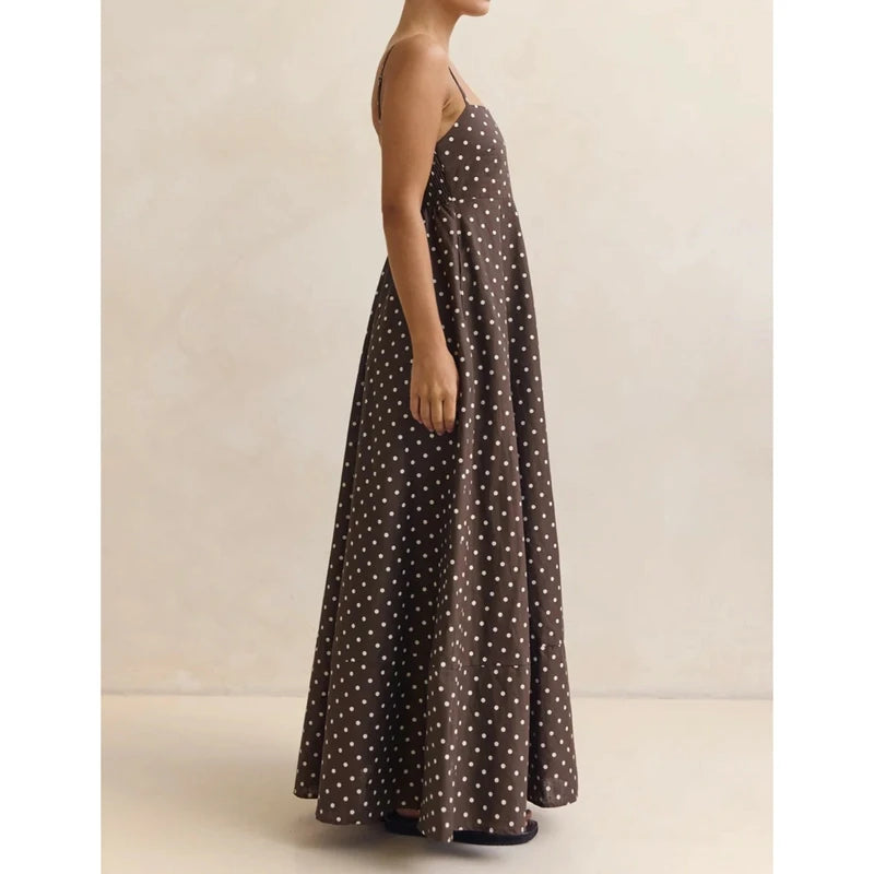 Model pose with hands in side pockets, highlighting the relaxed A-line skirt and easy drape through the hips.