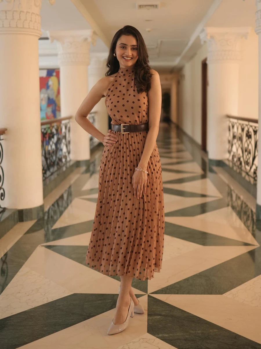 Brown polka dot pleated halter midi dress styled for autumn and events